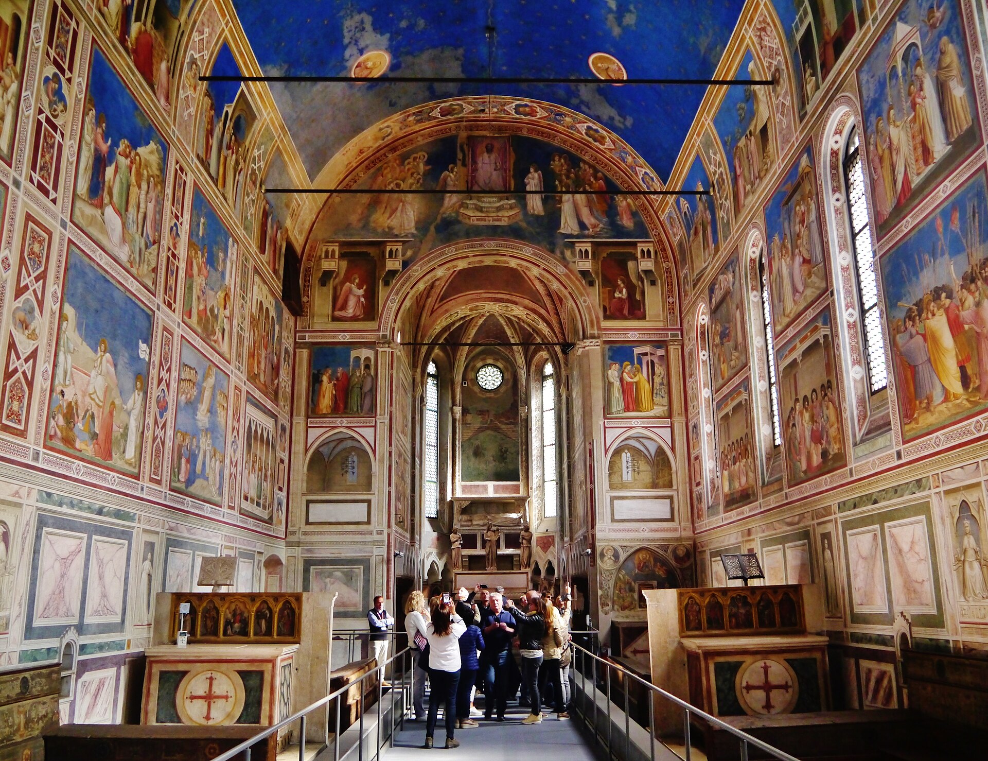 Interior of the Scrovegni Chapel showing the painted blue vault and fresco walls