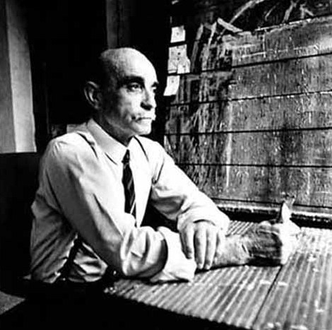 Black and white photographic portrait of the artist Lucio Fontana