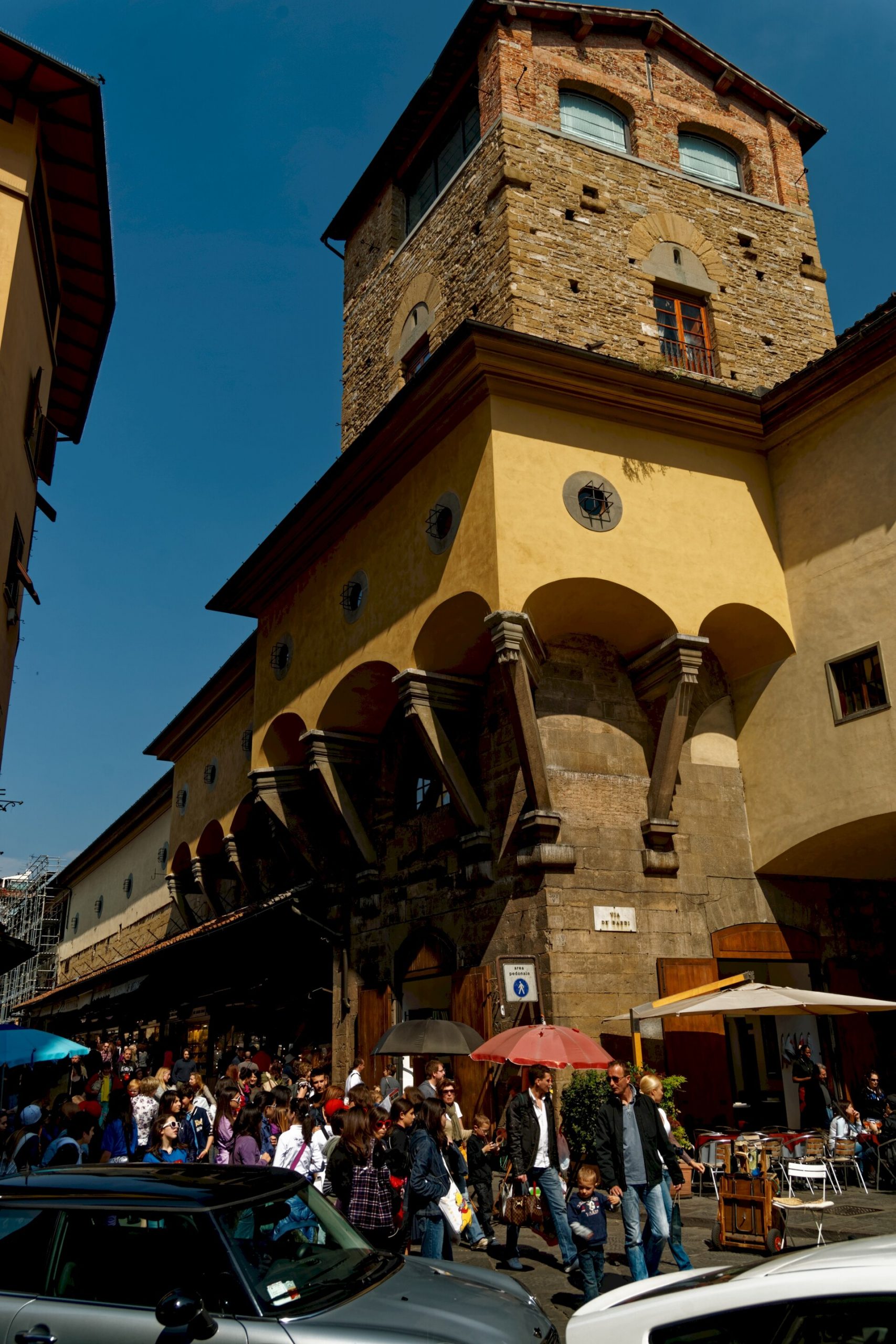 Ponte Vecchio in Florence with the elevated Vasari Corridor running above the shops