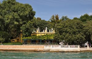 View across the Giardini della Biennale in Venice, with national pavilions among the trees